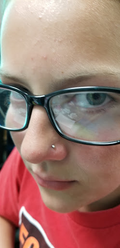 Explore tattoo ideas daisy, creative tattoo ideas in Saint Joseph, available at Self Expressions