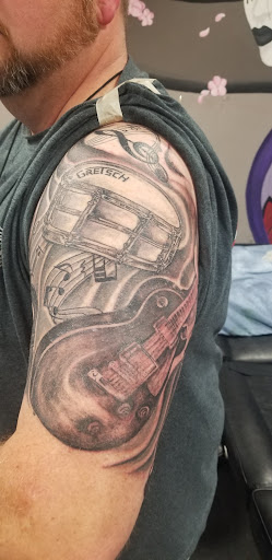 Explore rancher tattoo ideas, creative tattoo ideas in Akron, available at Studio X Tattoo