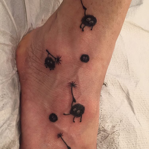 Explore cute frog tattoo ideas, creative tattoo ideas in Chapel Hill, available at Golden Falcon Tattoo and Piercing