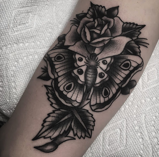 Explore rose vine tattoo ideas, creative tattoo ideas in Asheville, available at Valentine Tattoo & Piercing