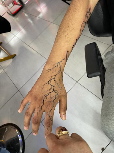 Find breast tattoo ideas for females for your next unique tattoo in San Diego at High Class Tattoo SD