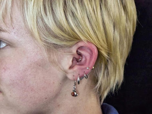 Find female breast tattoo ideas for your next unique tattoo in Portsmouth at Grim North Tattoo and Piercing