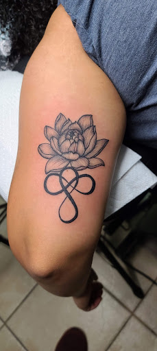 Explore tattoo ideas behind the ear, creative tattoo ideas in Houston, available at MS Studios Houstons Ink Therapy