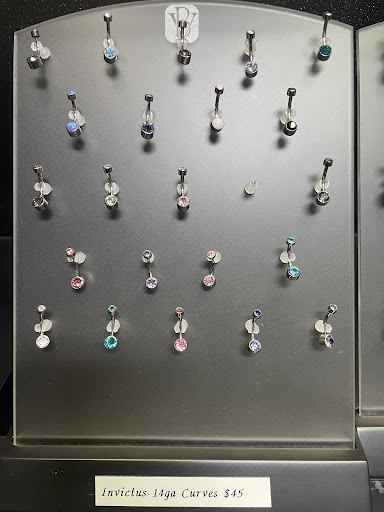 Explore sun tattoo ideas, creative tattoo ideas in Sarasota, available at Z-Edge Tattoo & Body Piercing South Shop