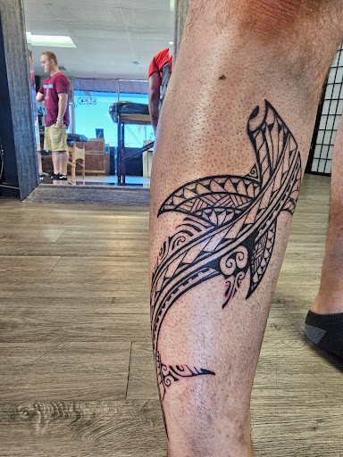 Explore statue tattoo ideas, creative tattoo ideas in Kailua Kona, available at Packing Ink Tattoos