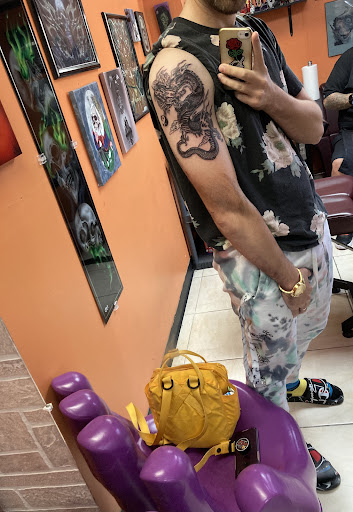 Explore book lovers tattoo ideas, creative tattoo ideas in Menomonee Falls, available at Color Bomb Tattoo Shop and Body Piercing