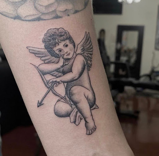 Explore lady thigh tattoo ideas, creative tattoo ideas in Fremont, available at Inkies Tattoo Studio
