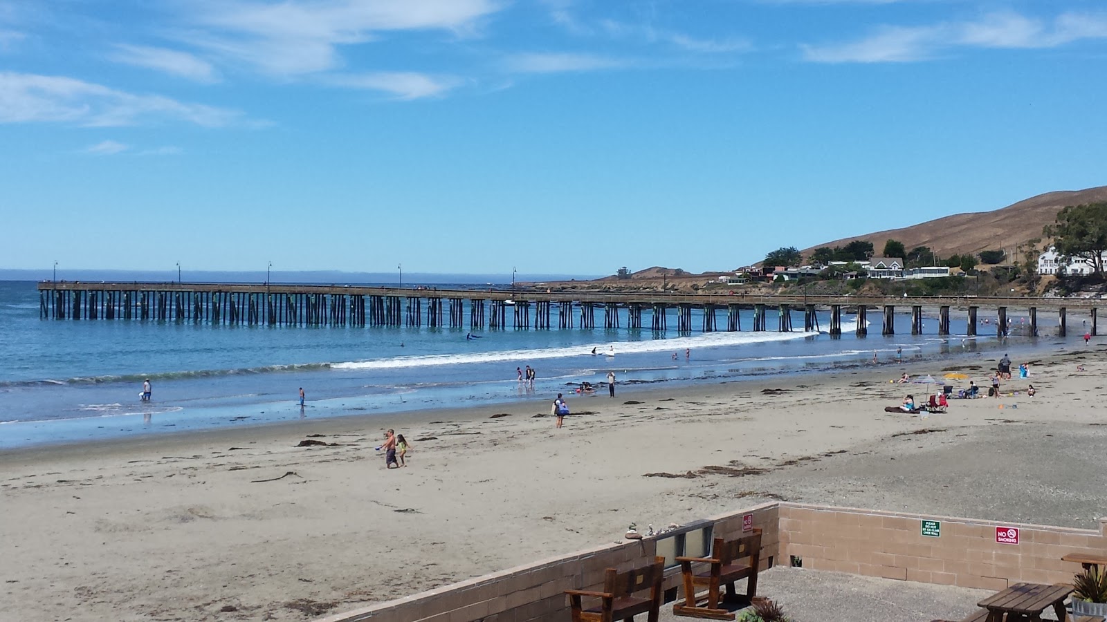 Photo of Cayucos Beach backed by cliffs