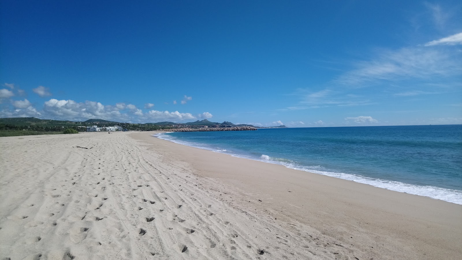 Foto de Playa Del Estero con arena beige superficie
