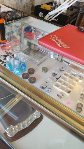 Tattoo Shop «Crimson Tattoos», reviews and photos, 106 W Main St, Owosso, MI 48867, USA