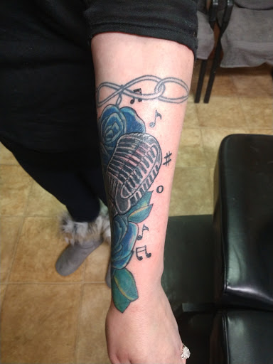 Find space tattoo ideas for your next unique tattoo in Conway at Primal Urge Tattoos