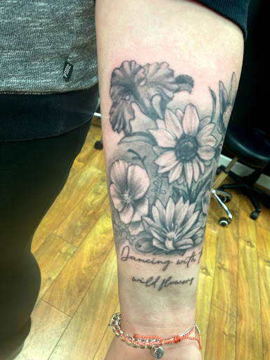 Explore middle finger tattoo ideas, creative tattoo ideas in Sioux Falls, available at Starry Eyed Studio