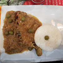 Poulet au curry du Restaurant de spécialités d'Afrique de l'Ouest Afrik'N'Fusion à Paris - n°9