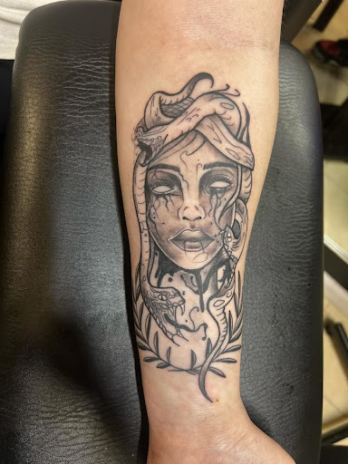 Explore joker and harley quinn tattoo ideas, creative tattoo ideas in Lakeville, available at Savage Ink
