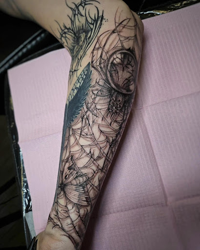 Explore mechanical tattoo ideas, creative tattoo ideas in Palm Harbor, available at Angry Owl Tattoo and Piercing