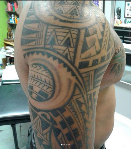 Explore men's rib tattoo ideas, creative tattoo ideas in League City, available at Zen Body Art & Adornment Tattoo Shop