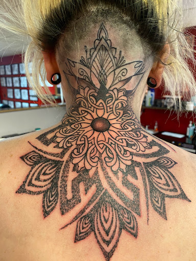 Explore good tattoo ideas for sleeves, creative tattoo ideas in Pikeville, available at The Carbon Canary Tattoo Studio
