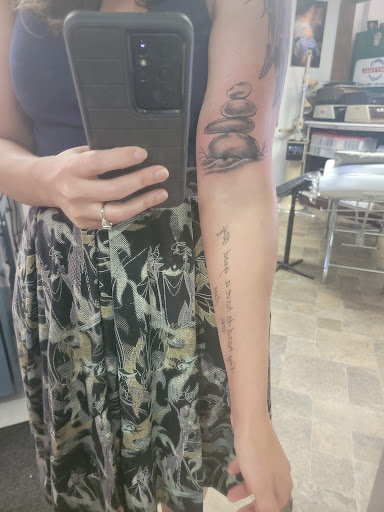 Explore micro realism tattoo ideas, creative tattoo ideas in Wallace, available at Dans Tattoo Shop