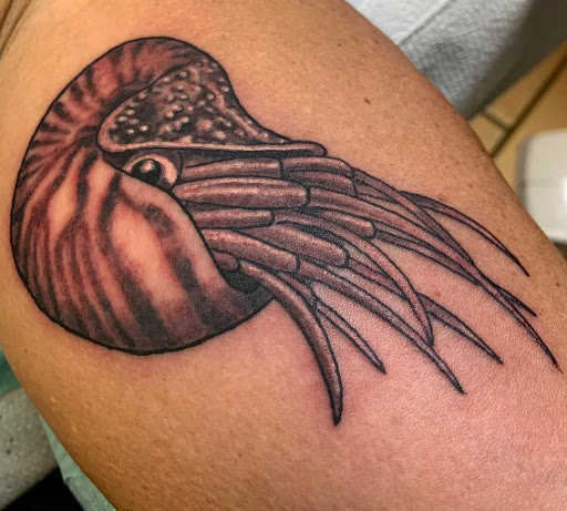 Explore black clover tattoo ideas, creative tattoo ideas in Stuart, available at Tiger Shark Tattoo Studio
