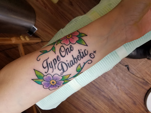 Tattoo Shop «Royalty Tattoo», reviews and photos, 103 N Saginaw St, Durand, MI 48429, USA