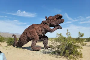 Dying Dinosaur Sculpture image