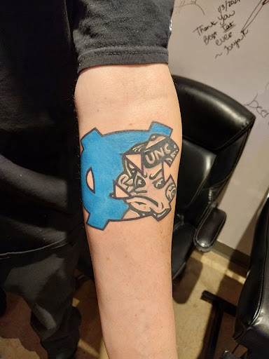 Explore lizard tattoo ideas, creative tattoo ideas in Charlottesville, available at Tatted Souls LLC