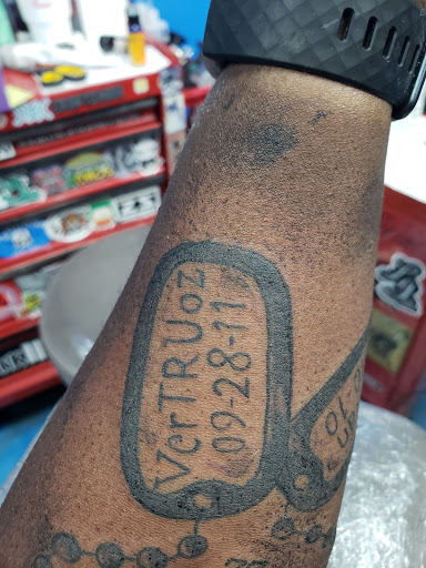 Explore tattoo ideas back of neck, creative tattoo ideas in Florissant, available at St. Louis Ink