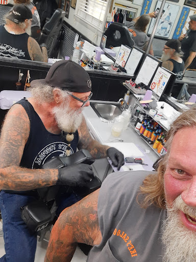 Explore black and grey half sleeve tattoo ideas, creative tattoo ideas in Ormond Beach, available at Tropical Tattoo Inc