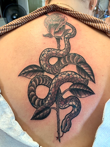 Explore hood neck tattoos ideas, creative tattoo ideas in Cape Coral, available at UNRIVALED INK