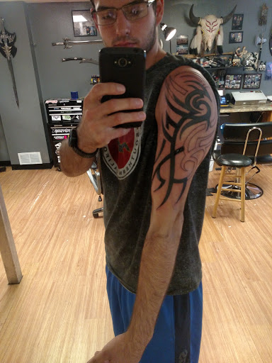 Explore tattoo ideas for bodybuilding, creative tattoo ideas in Auburn, available at Underground Ink