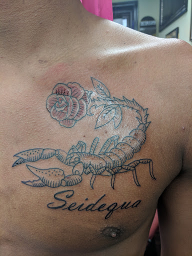 Explore puerto rico map tattoo ideas, creative tattoo ideas in Ozone Park, available at Pete & Cubos Tattooing & Body Piercing