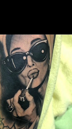 Explore cervical cancer tattoo ideas, creative tattoo ideas in Middletown, available at Traditionally Twisted Tattoo