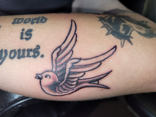 Explore new york giants tattoo ideas, creative tattoo ideas in Angola, available at Hoodlum Ink