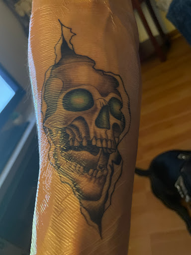 Explore hell hound tattoo ideas, creative tattoo ideas in Largo, available at Alchemy Tattoos and Body Piercings