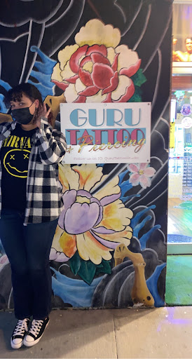 Explore men's back of neck tattoo ideas, creative tattoo ideas in West Palm Beach, available at GURU Tattoo & Piercing - Palm Beach County