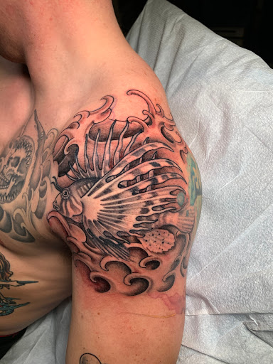 Explore tattoo ideas female back, creative tattoo ideas in Arlington, available at Benchmark Tattoos