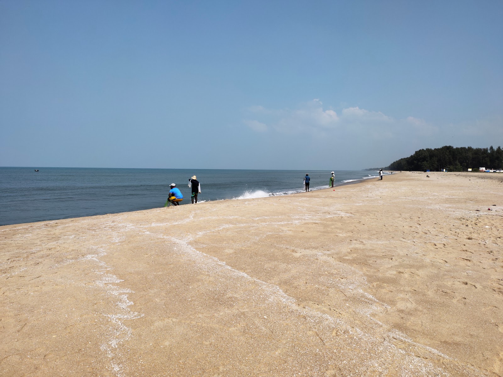 Foto van Munnakal Beach met helder zand oppervlakte