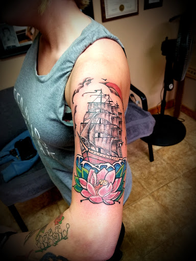 Explore butterfly foot tattoo ideas, creative tattoo ideas in Conway, available at Primal Urge Tattoos