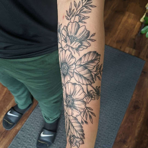 Explore cover up tattoo ideas female arm, creative tattoo ideas in Lawrence, available at Standard Electric Tattooing
