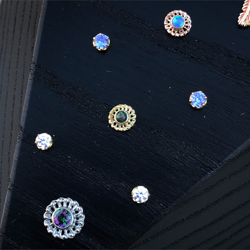 Find tattoos ideas for mothers for your next unique tattoo in Candler at Be The Change Piercing & Tattoo