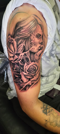 Find tattoo ideas for a mom for your next unique tattoo in Angola at Hoodlum Ink