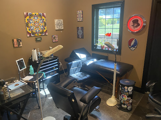 Explore cover up tattoo ideas on shoulder, creative tattoo ideas in Bloomington, available at Til Death Tattoo And Piercing Parlor