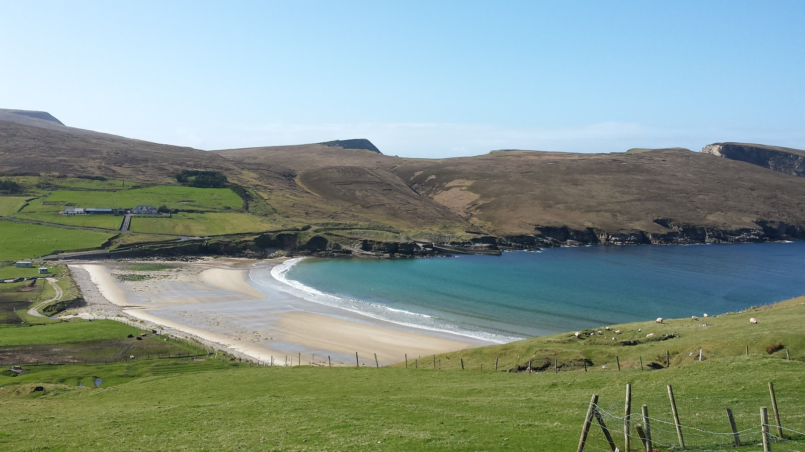 Photo of Portacloy Beach backed by cliffs