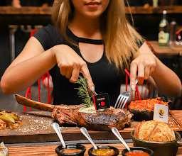 Carbón Parrilla de Barrio - Juan Palomar photo