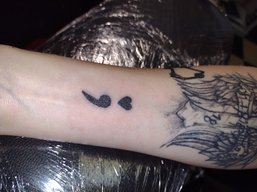 Explore halloween tattoo ideas for women, creative tattoo ideas in Owosso, available at Twisted ink tattoo