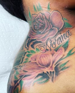 Explore tramp stamp lower back tattoo cover up ideas, creative tattoo ideas in Brooklyn, available at Well Worthy Ink Shop