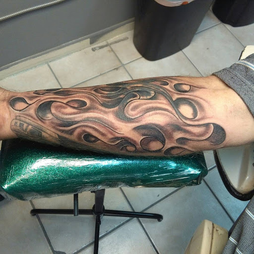 Explore hand tattoo ideas simple, creative tattoo ideas in Bradenton, available at Memory Lane Tattoo Co.