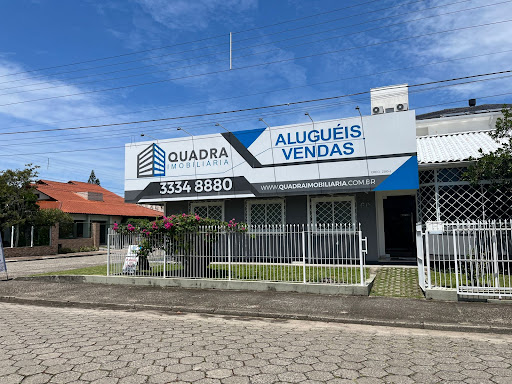 Logo da empresa - Quadra Imobiliária