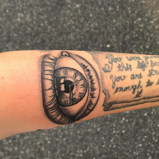 Explore mom tattoo ideas for sons, creative tattoo ideas in Calhoun, available at Velvet Panther Tattoo and Piercing