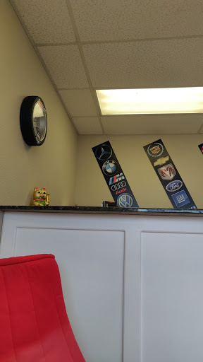 Car Repair and Maintenance «Jr. Auto Repair», reviews and photos, 8243 Narcoossee Park Dr #400, Orlando, FL 32822, USA